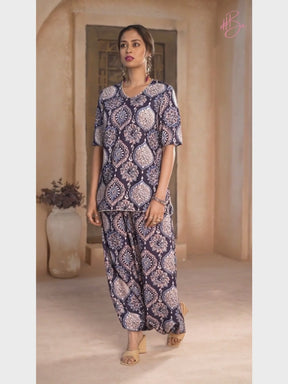 Hashtag Be Featuring a printed kurti set with stylised dhoti with slit