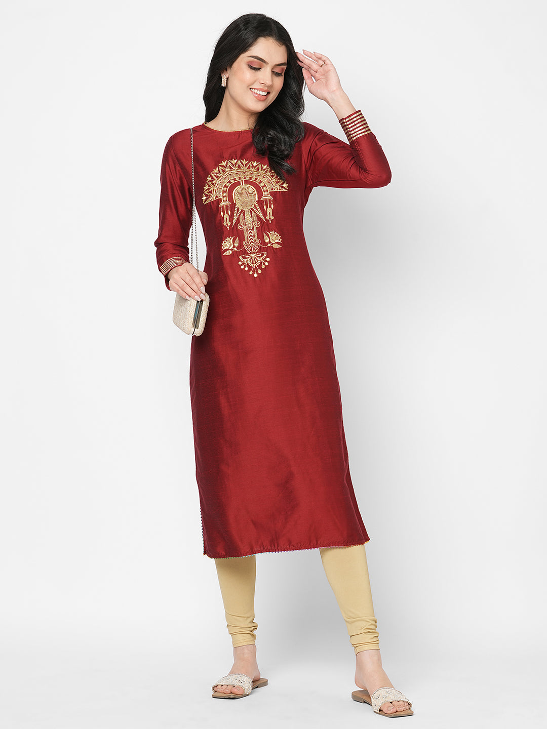 A Long Straight Festive Kurta With Elaborate Gold Thread Work