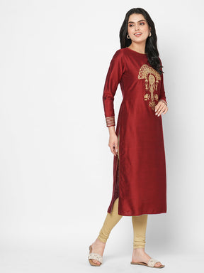 A Long Straight Festive Kurta With Elaborate Gold Thread Work