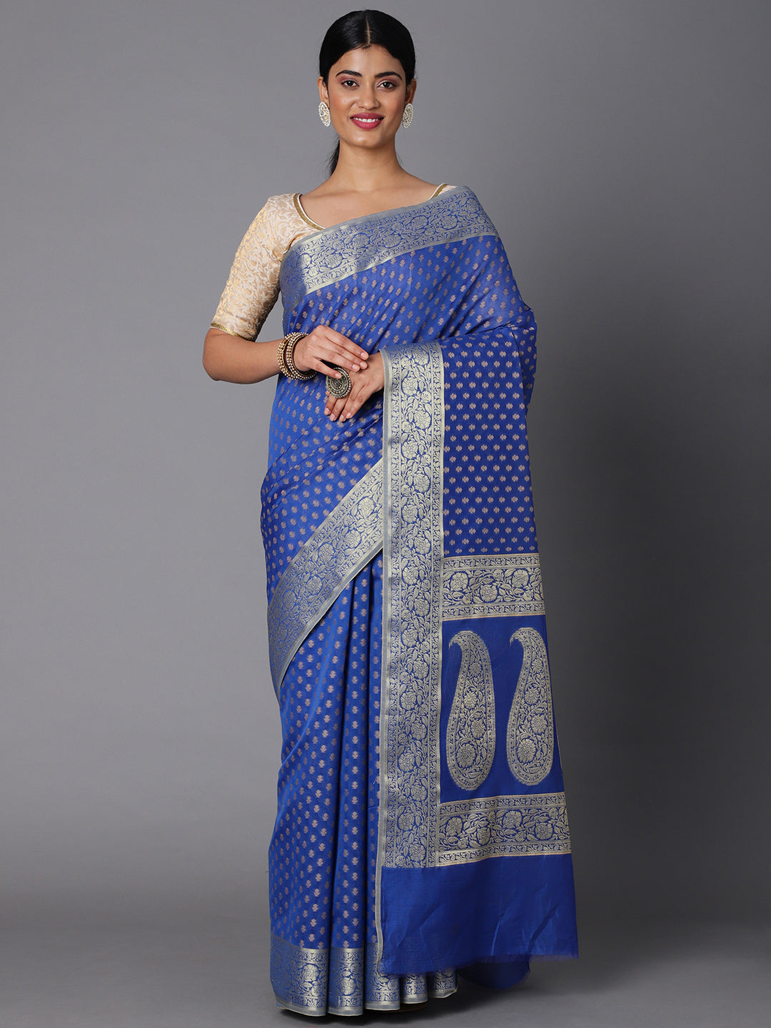 Features A Sheer Cotton Blend Saree With Jacquard Ethnic Buttis All Over