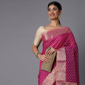 Features A Sheer Cotton Blend Saree With Jacquard Ethnic Buttis All Over