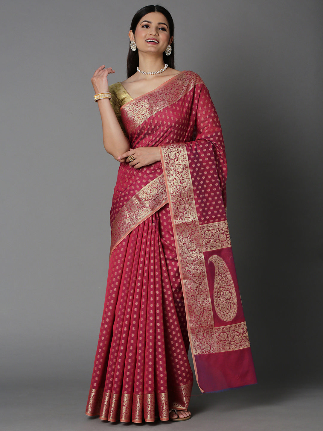 Features A Sheer Cotton Blend Saree With Jacquard Ethnic Buttis All Over