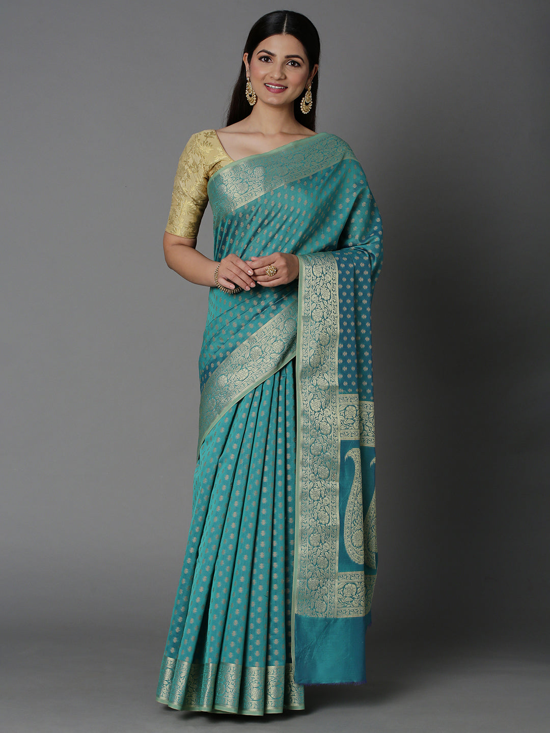 Features A Sheer Cotton Blend Saree With Jacquard Ethnic Buttis All Over