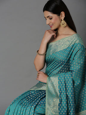 Features A Sheer Cotton Blend Saree With Jacquard Ethnic Buttis All Over