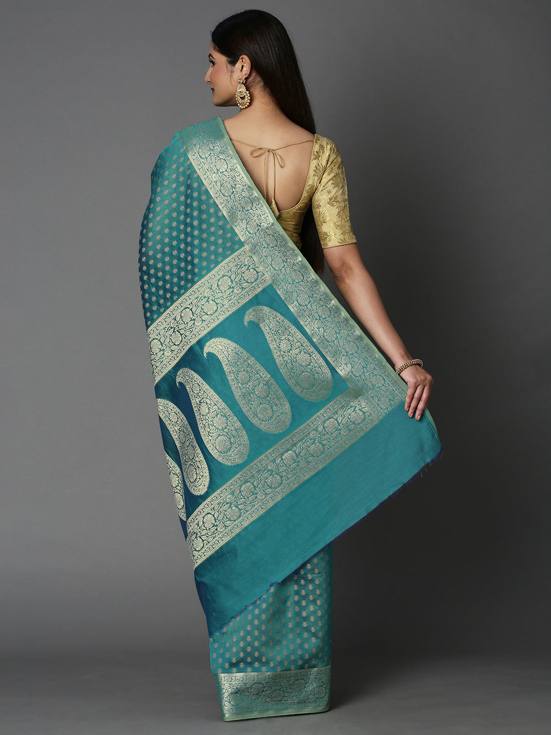 Features A Sheer Cotton Blend Saree With Jacquard Ethnic Buttis All Over