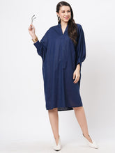 Featuring A Wide Relaxed Fit Kaftan Sleeve Knee Length Dress In Solid Blue