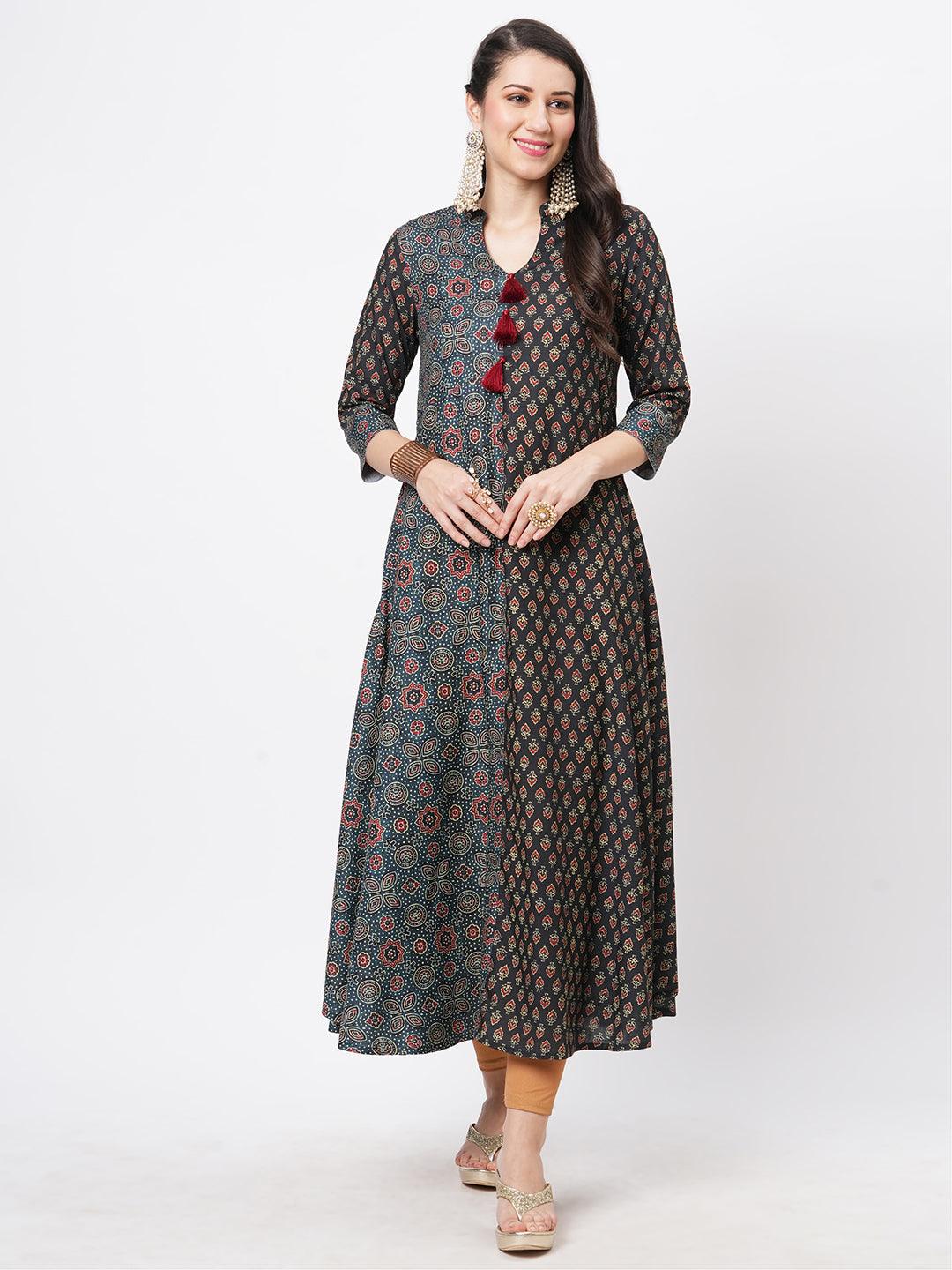 Forest Green Two Print Long Flared Kurta Complimenting Each Other With Contrast Color Tassel At The Neck.