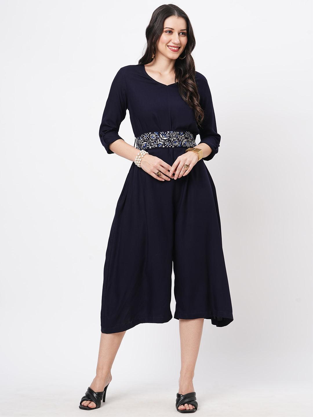 Featuring Navy Viscose Rayon Calf Length Jumpsuit With Emmbroidered Belt.