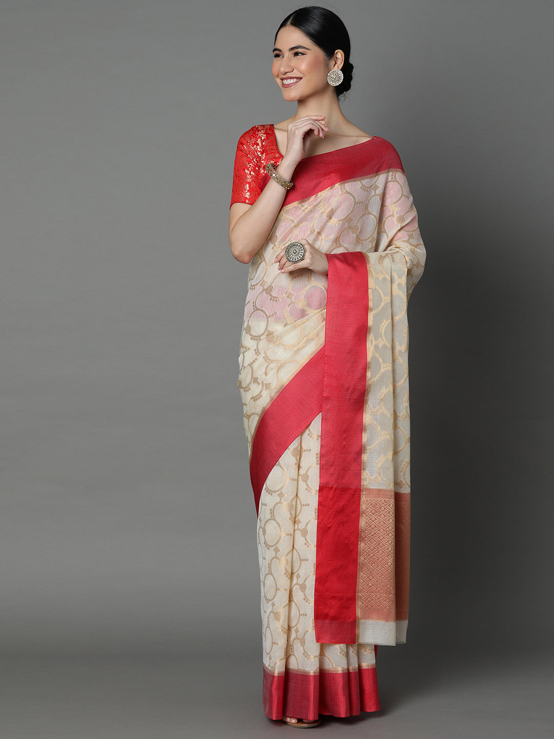 Features A Sheer Kota Saree With Texture And Circular Motif In Gold All Over