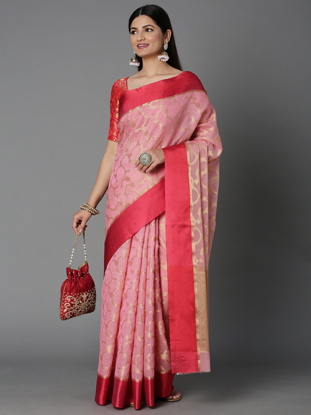 Features A Sheer Kota Saree With Texture And Circular Motif In Gold All Over