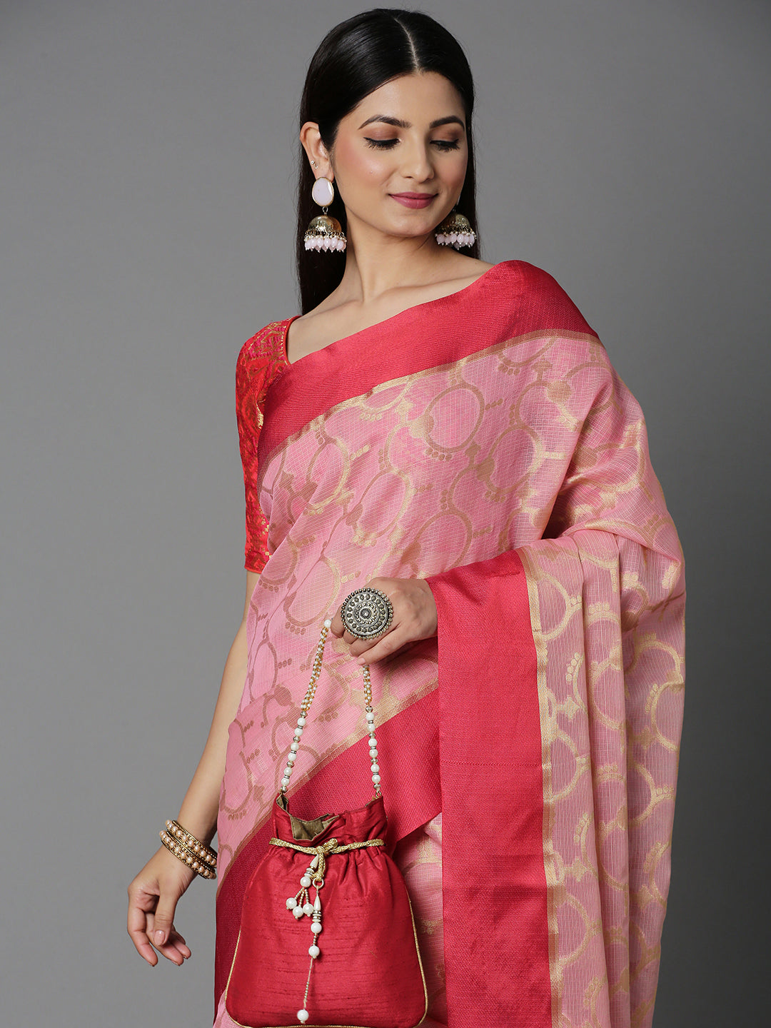 Features A Sheer Kota Saree With Texture And Circular Motif In Gold All Over