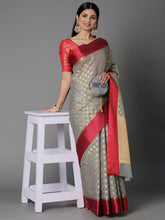 Features A Sheer Kota Saree With Texture And Buttis In Gold All Over