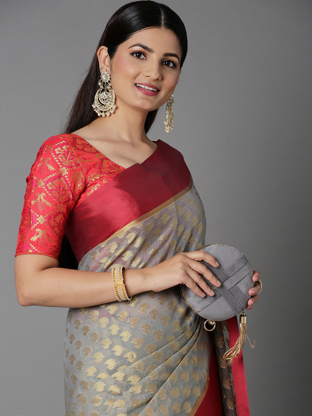 Features A Sheer Kota Saree With Texture And Buttis In Gold All Over