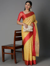 Features A Sheer Kota Saree With Texture And Buttis In Gold All Over