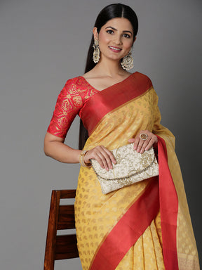 Features A Sheer Kota Saree With Texture And Buttis In Gold All Over