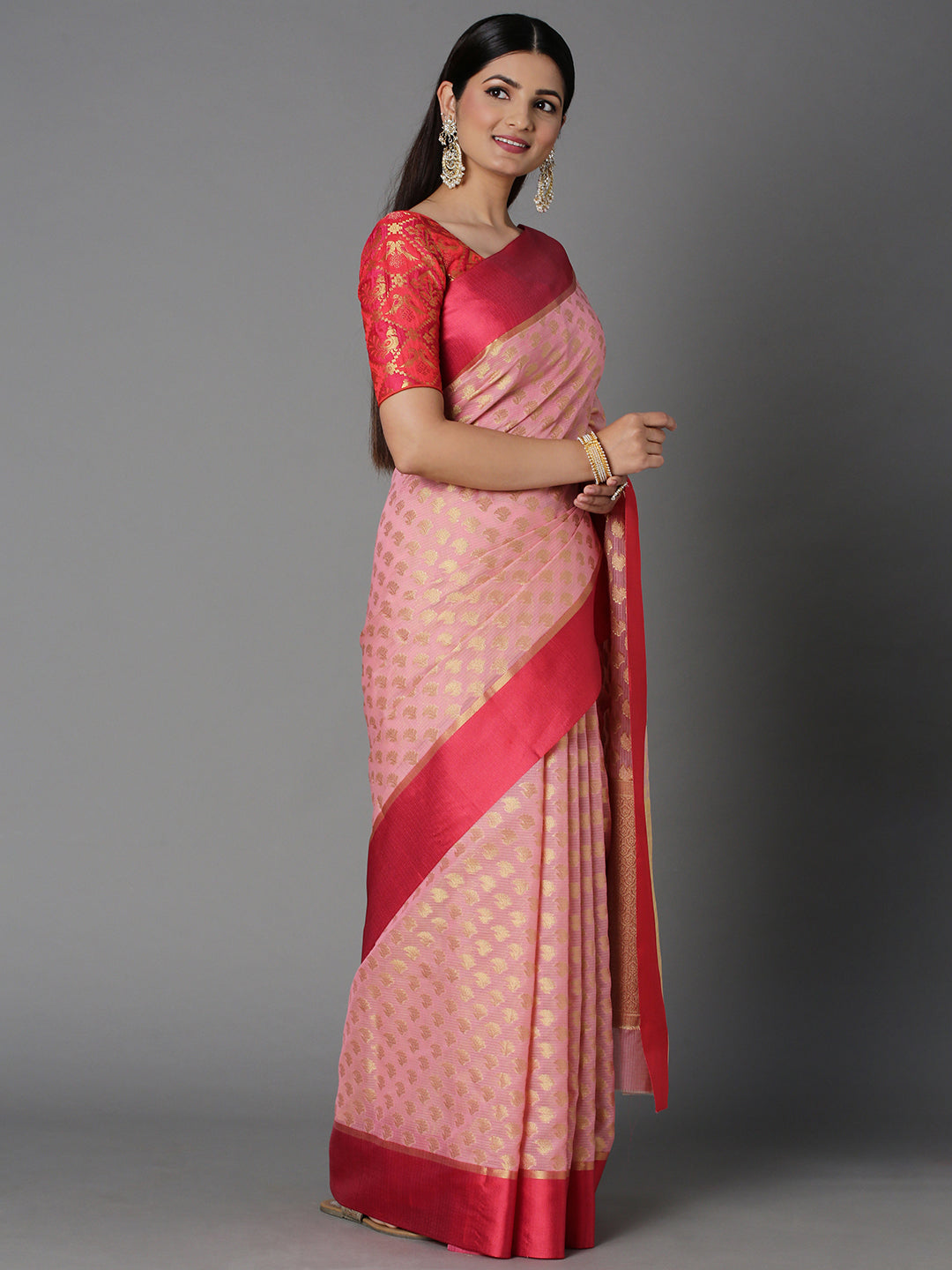 Features A Sheer Kota Saree With Texture And Buttis In Gold All Over