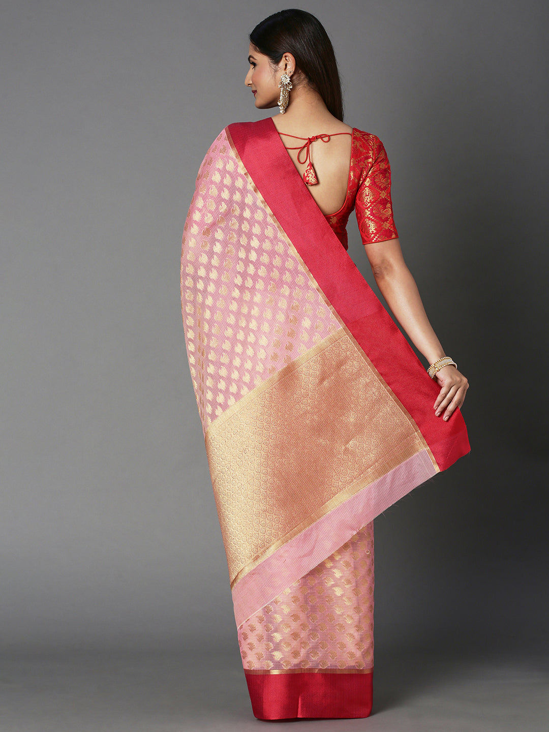 Features A Sheer Kota Saree With Texture And Buttis In Gold All Over