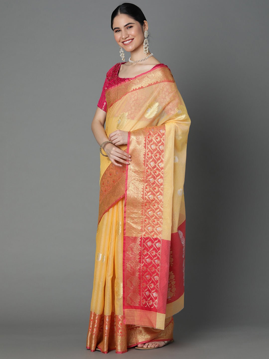 Featuring A Sheer Textured Saree With Butti All Over Highlighted With 2 Borders