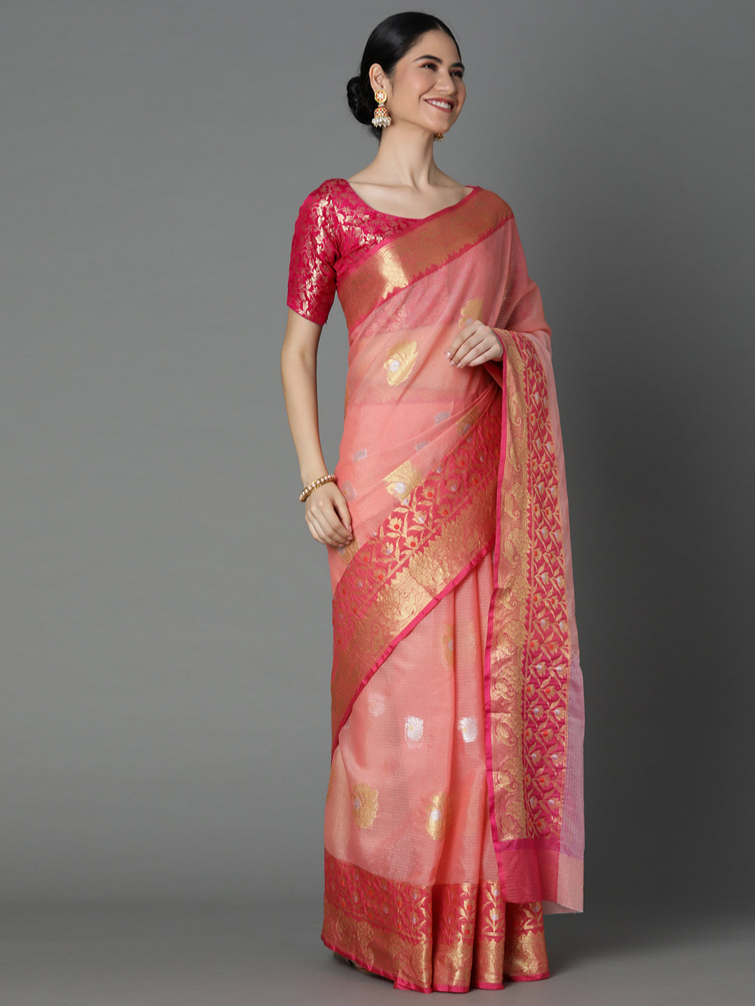 Featuring A Sheer Textured Saree With Butti All Over Highlighted With 2 Borders