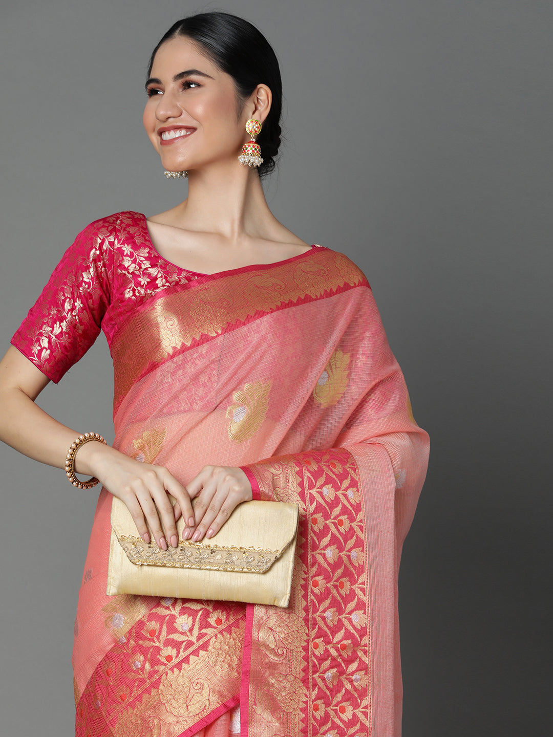 Featuring A Sheer Textured Saree With Butti All Over Highlighted With 2 Borders