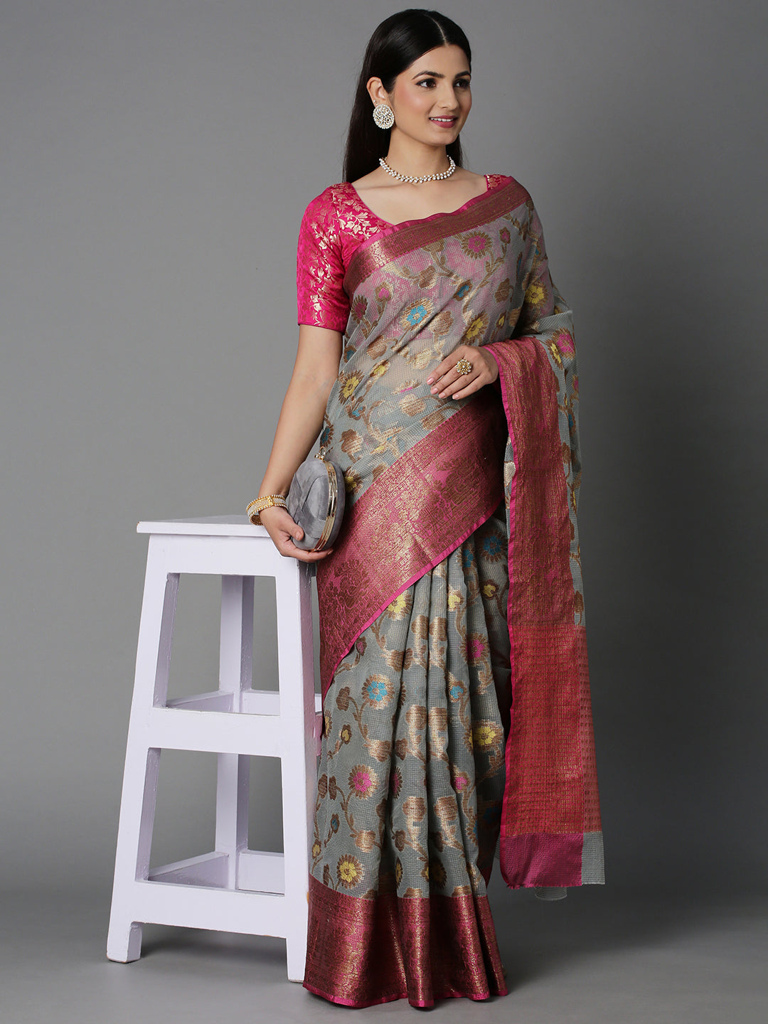 Featuring A Sheer Grey Saree With Multi Colored Floral Motifs All Over