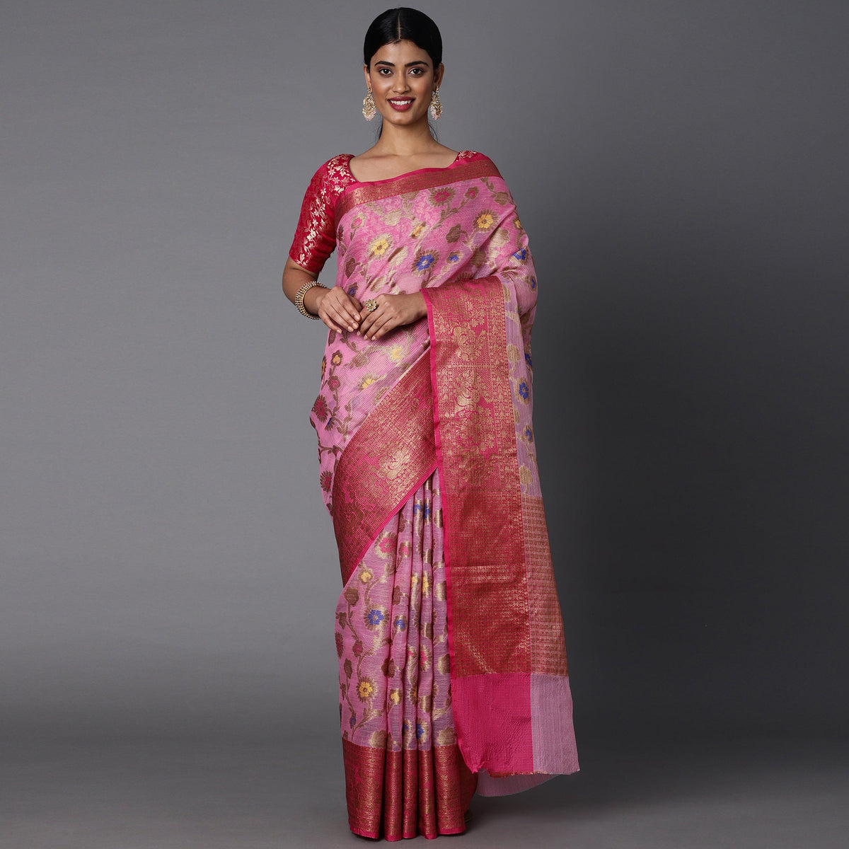 Featuring A Sheer Light Pink Saree With Multi Colored Floral Motifs All Over