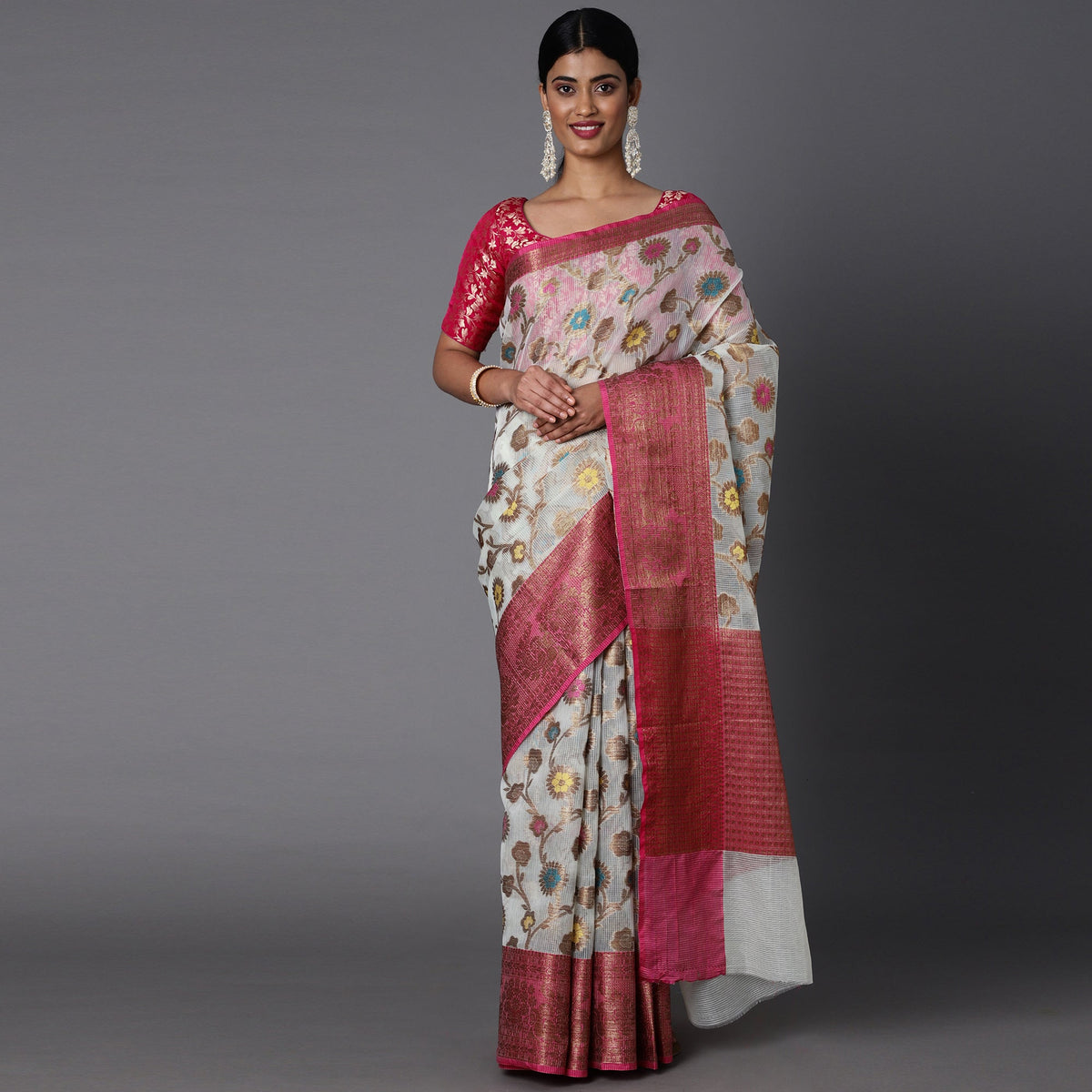 Featuring A Sheer Offwhite Saree With Multi Colored Floral Motifs All Over