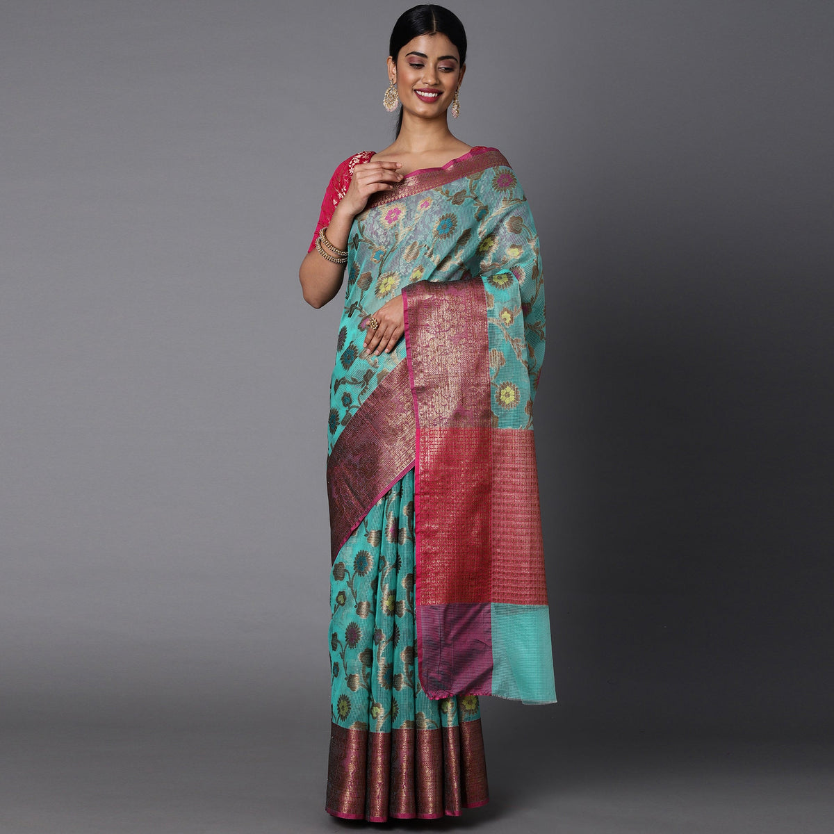 Featuring A Sheer Seagreen Saree With Multi Colored Floral Motifs All Over