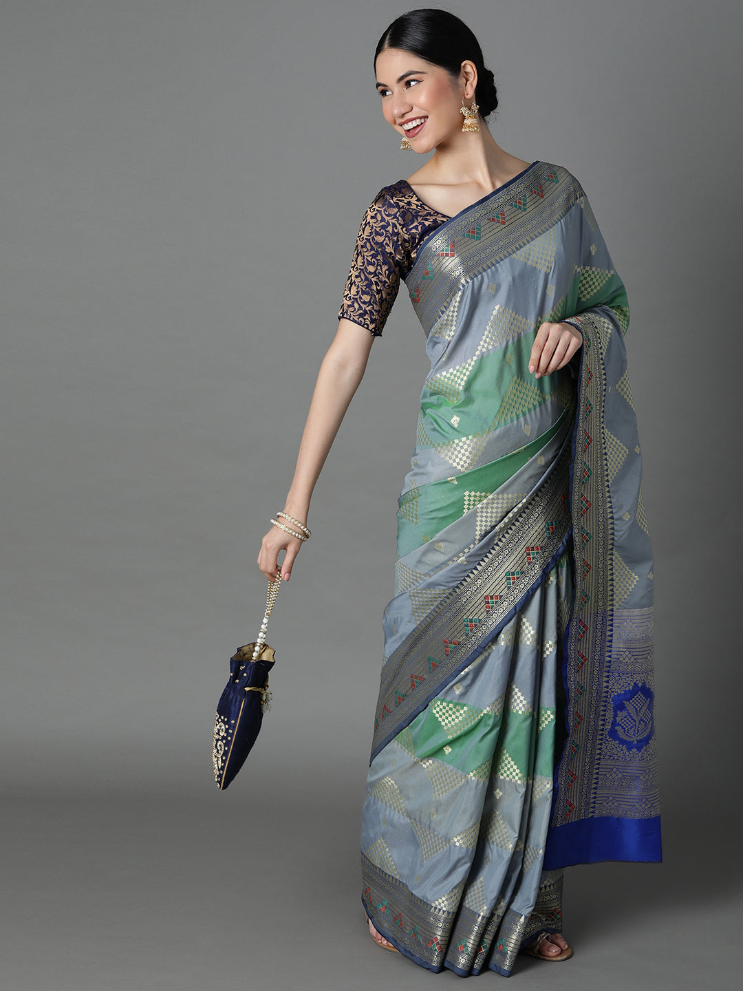 Adorn This Splendid Silk Blend Saree With Geometric Motif All Over