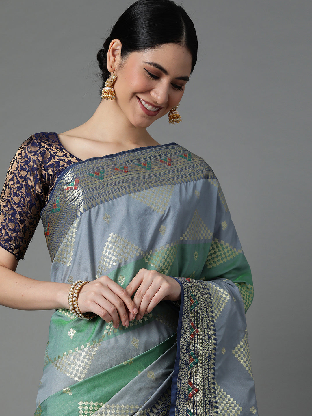 Adorn This Splendid Silk Blend Saree With Geometric Motif All Over