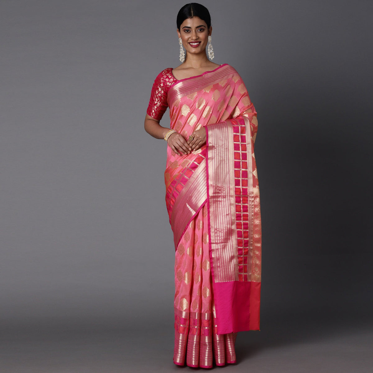 Features A Bold Silk  Blend Saree With Jacquard Ethnic Buttis All Over In Gold