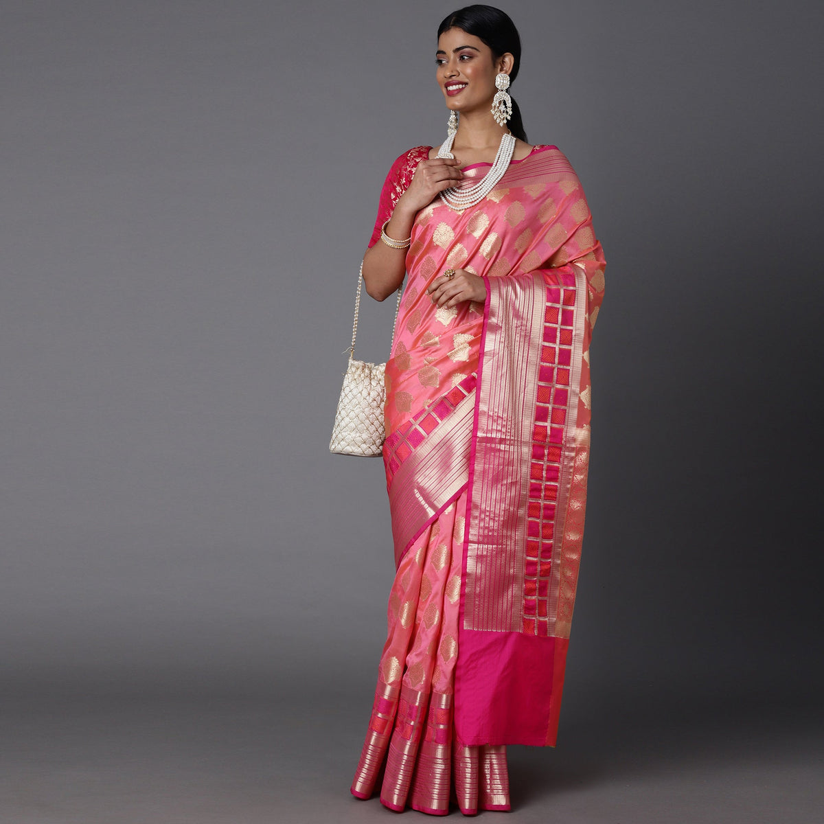 Features A Bold Silk  Blend Saree With Jacquard Ethnic Buttis All Over In Gold