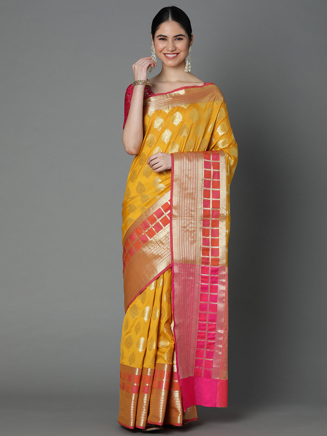 Features A Bold Silk  Blend Saree With Jacquard Ethnic Buttis All Over In Gold