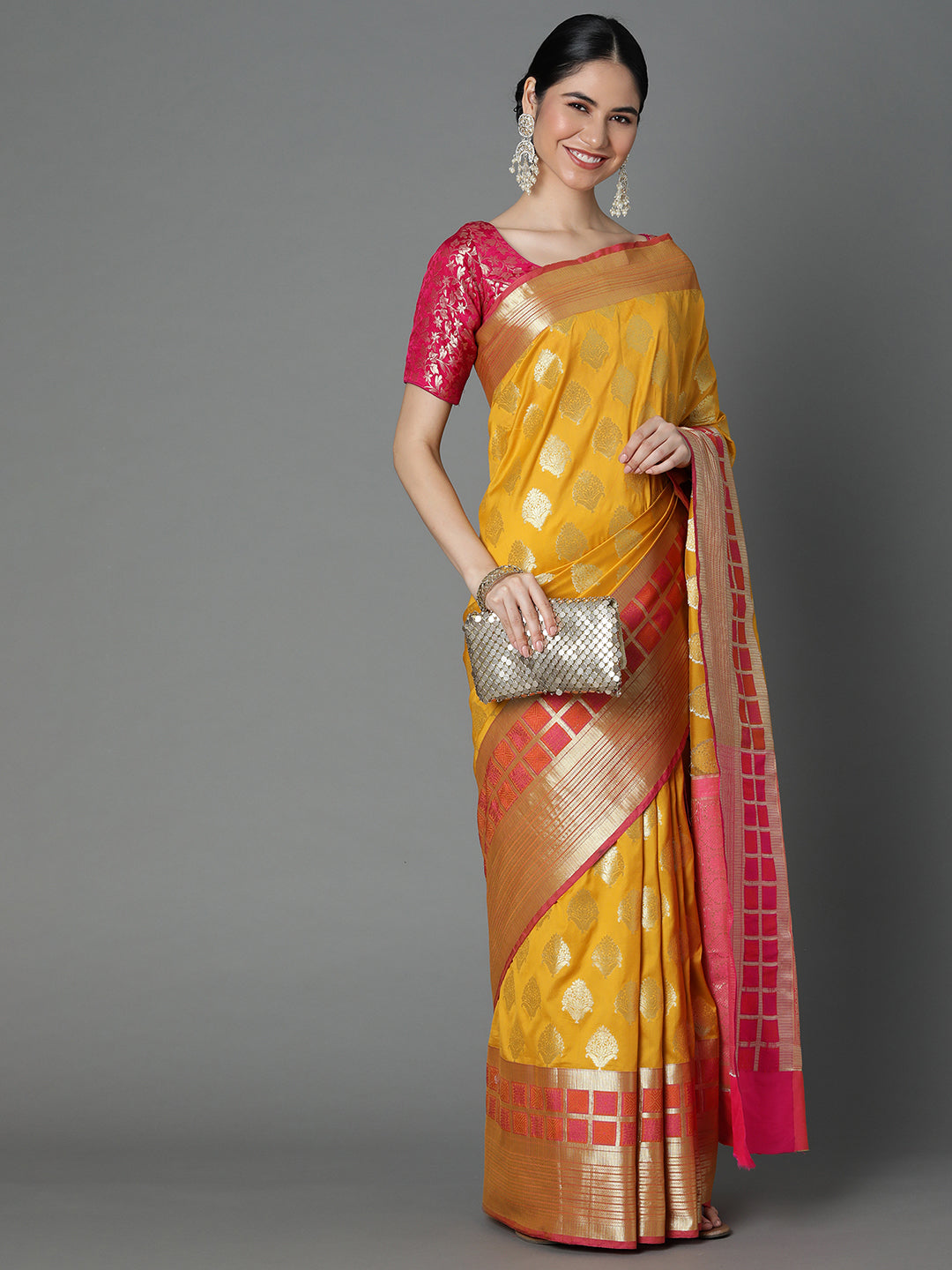 Features A Bold Silk  Blend Saree With Jacquard Ethnic Buttis All Over In Gold