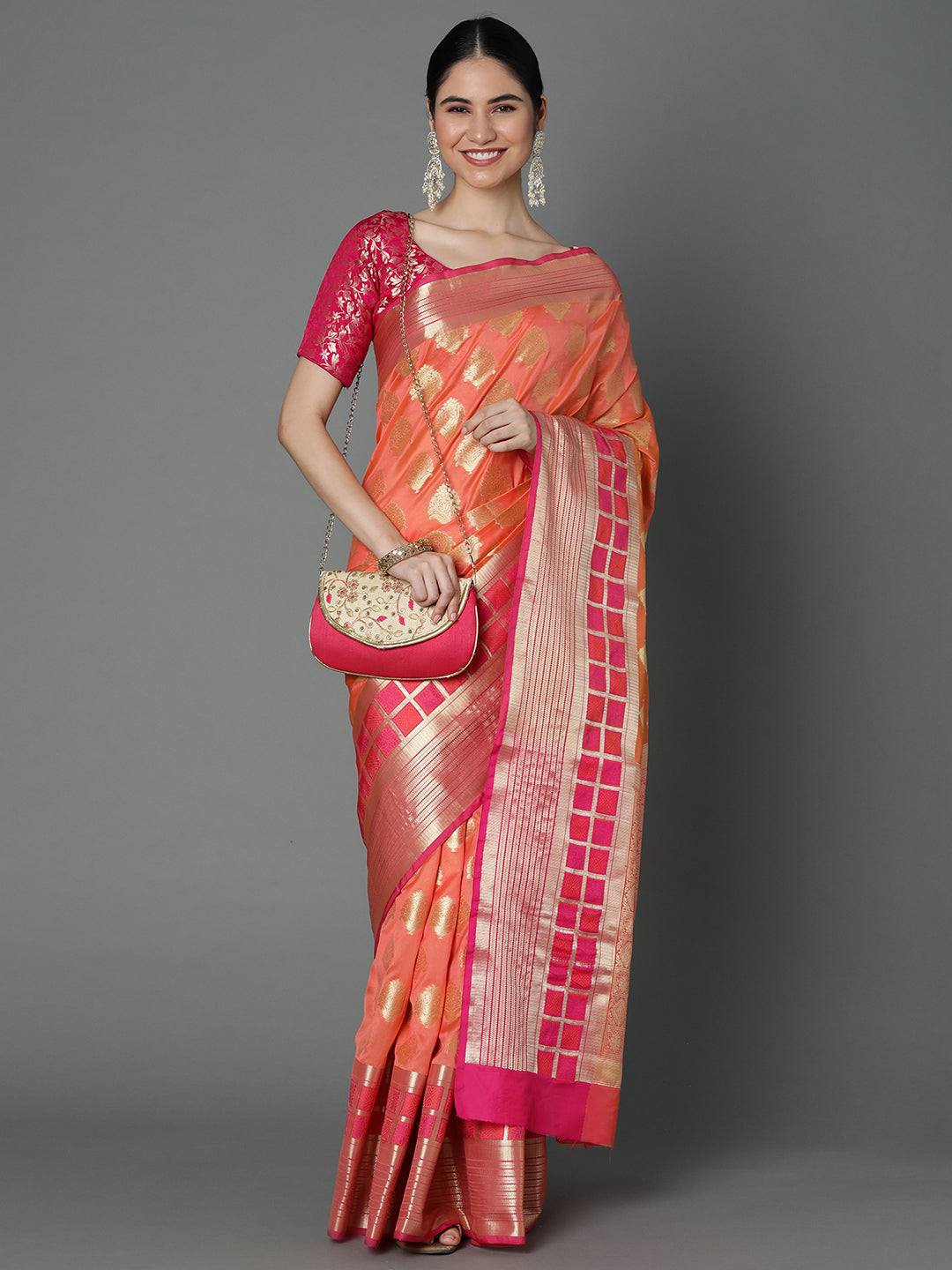 Features A Bold Silk  Blend Saree With Jacquard Ethnic Buttis All Over In Gold