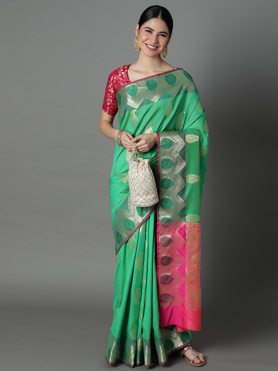 Features A Bold Silk  Blend Saree With Jacquard Ethnic Buttis All Over In Gold