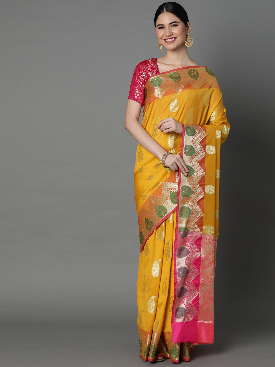 Features A Bold Silk  Blend Saree With Jacquard Ethnic Buttis All Over In Gold