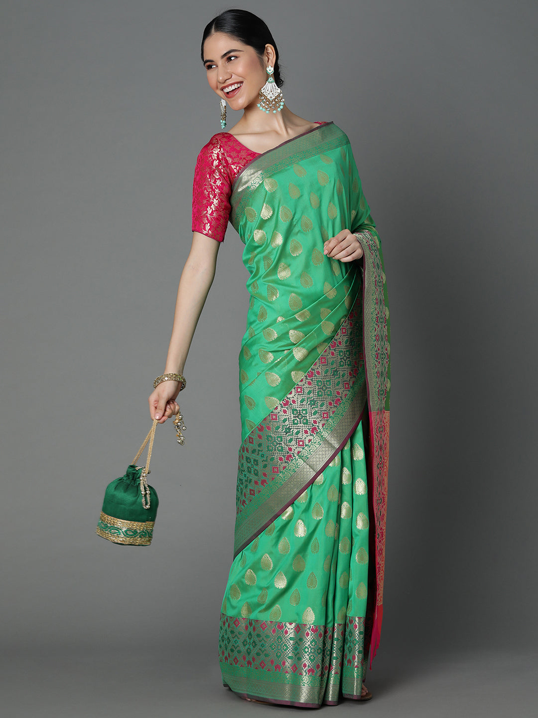 Features A Bold Silk  Blend Saree With Jacquard Ethnic Buttis All Over In Gold