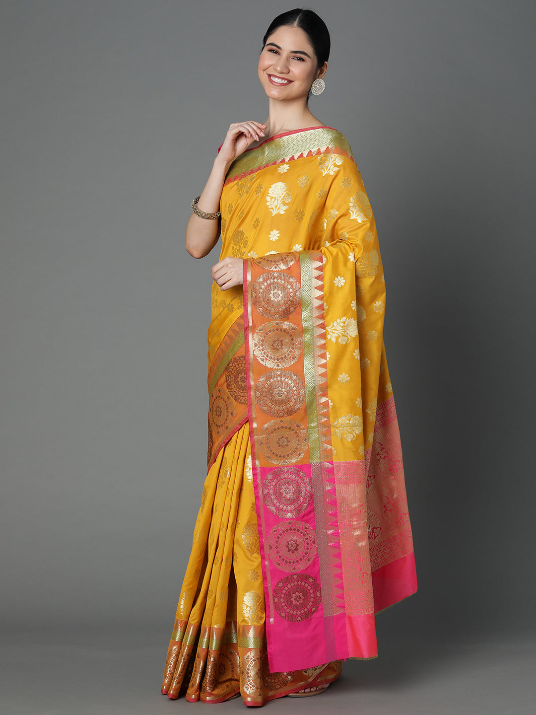 Features A Bold Silk  Blend Saree With Jacquard Ethnic Buttis All Over In Gold