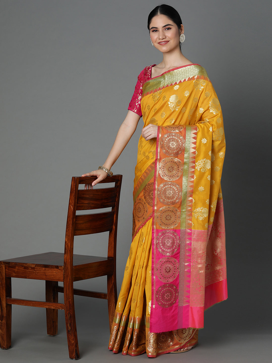 Features A Bold Silk  Blend Saree With Jacquard Ethnic Buttis All Over In Gold