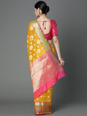 Features A Bold Silk  Blend Saree With Jacquard Ethnic Buttis All Over In Gold