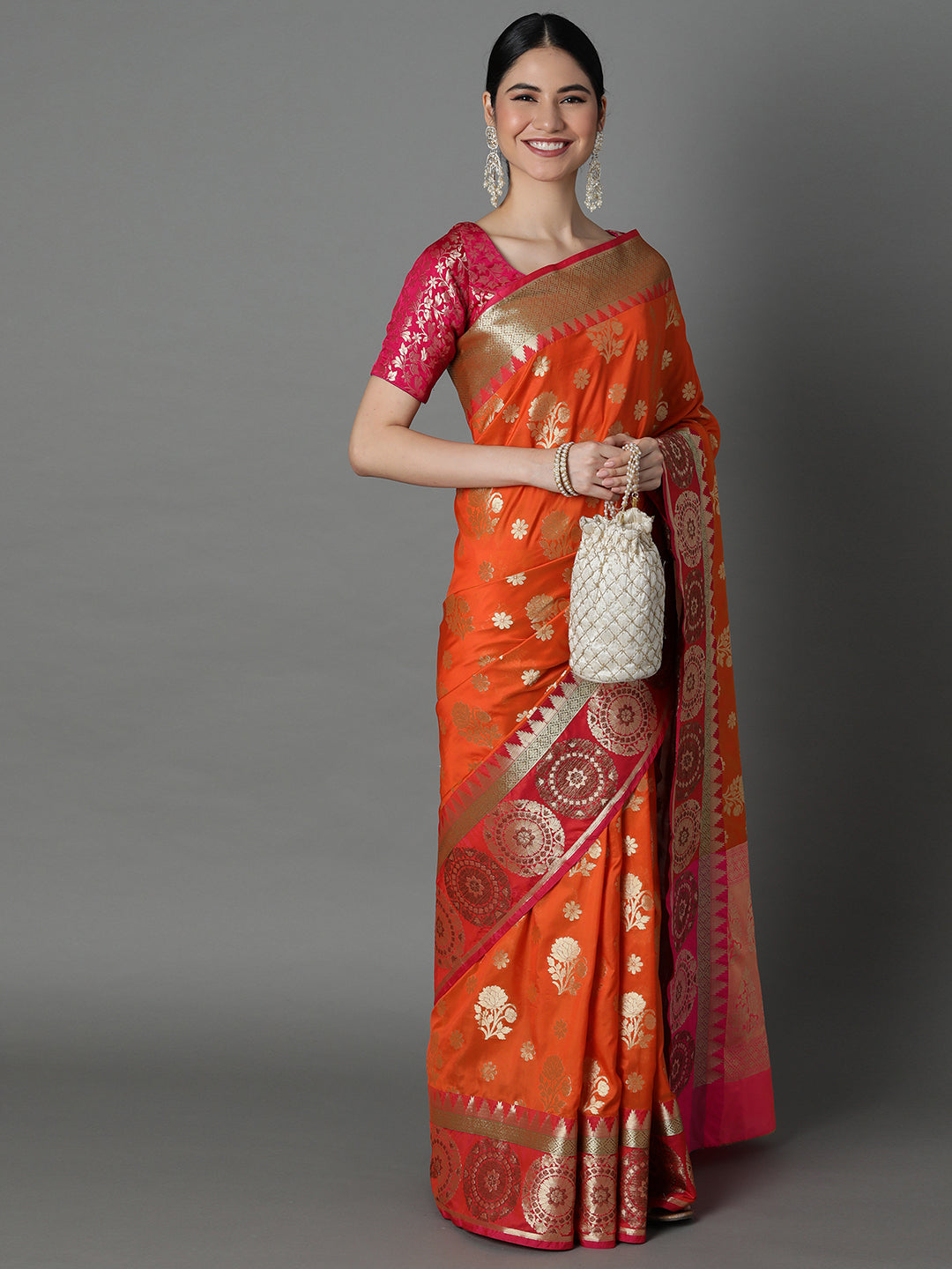 Features A Bold Silk  Blend Saree With Jacquard Ethnic Buttis All Over In Gold