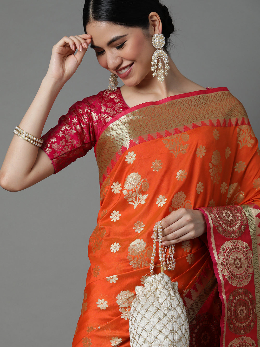 Features A Bold Silk  Blend Saree With Jacquard Ethnic Buttis All Over In Gold