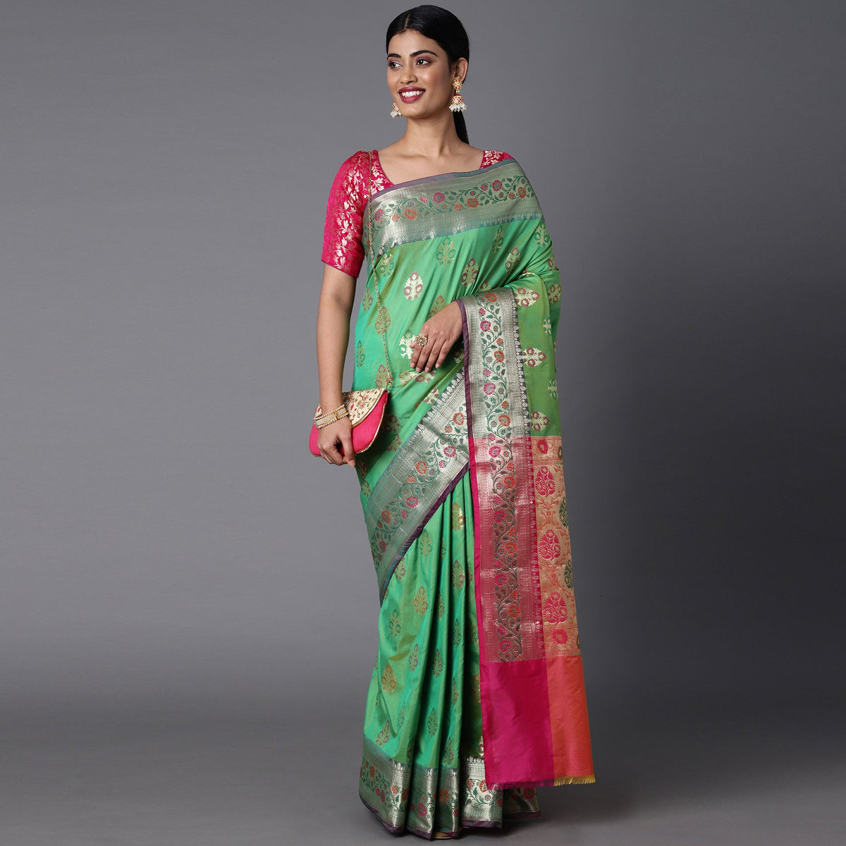 Features A Bold Silk  Blend Saree With Jacquard Ethnic Buttis All Over In Gold