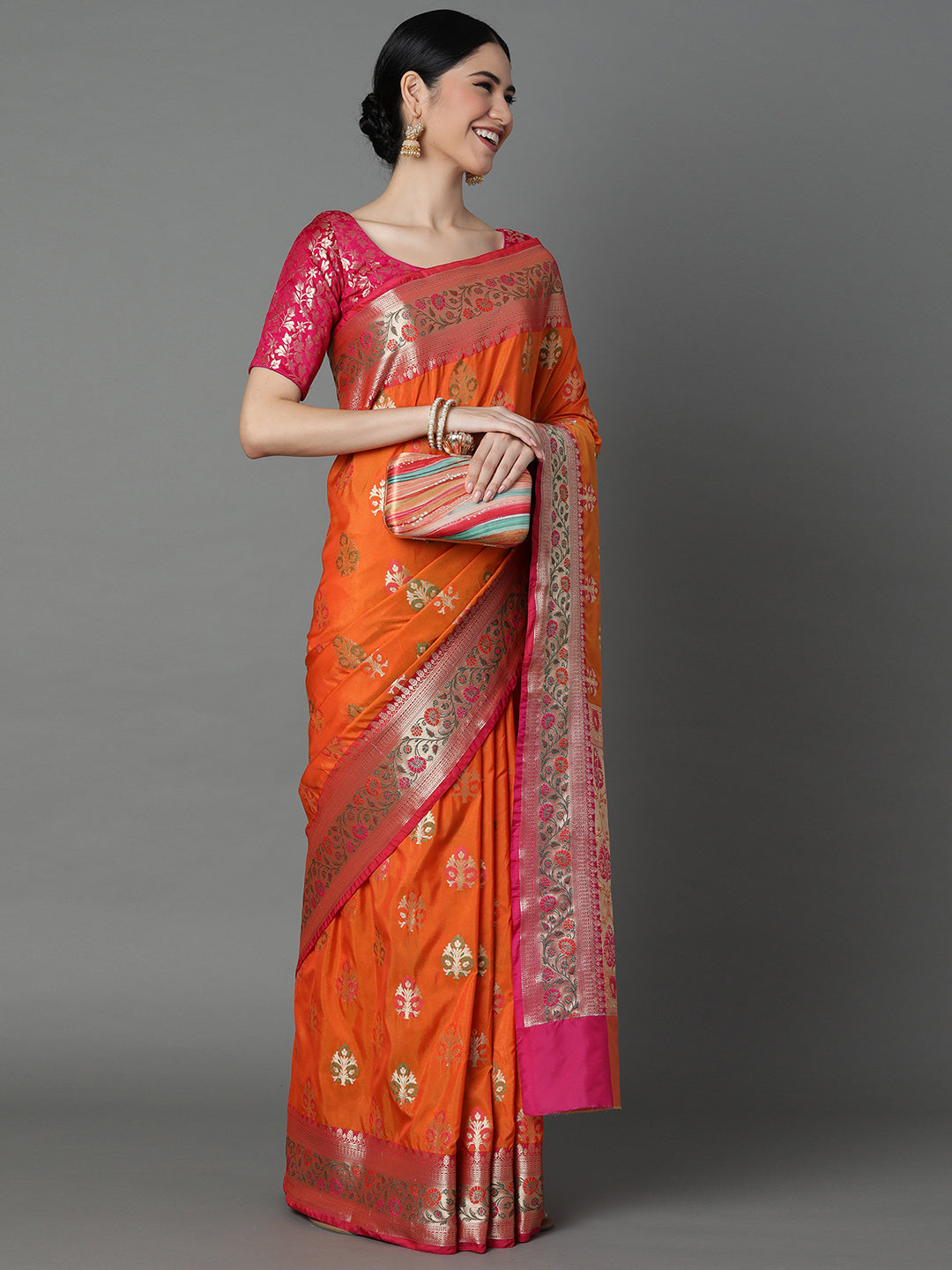 Features A Bold Silk  Blend Saree With Jacquard Ethnic Buttis All Over In Gold