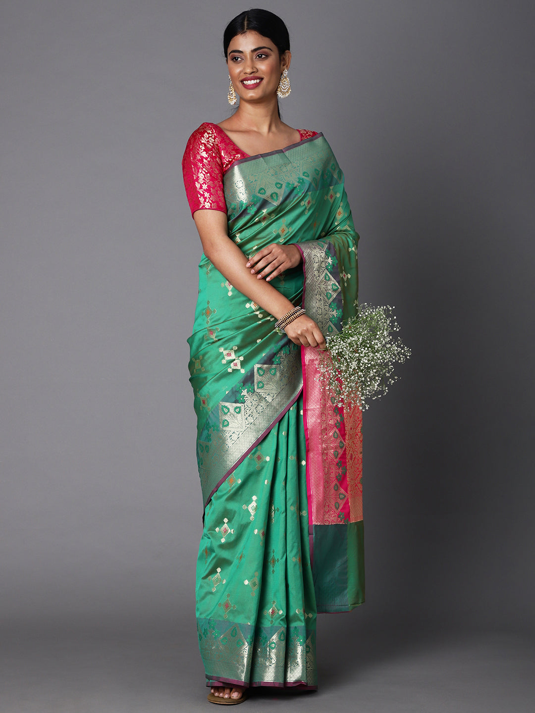 Features A Bold Silk  Blend Saree With Jacquard Ethnic Buttis All Over In Gold