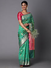 Features A Bold Silk  Blend Saree With Jacquard Ethnic Buttis All Over In Gold