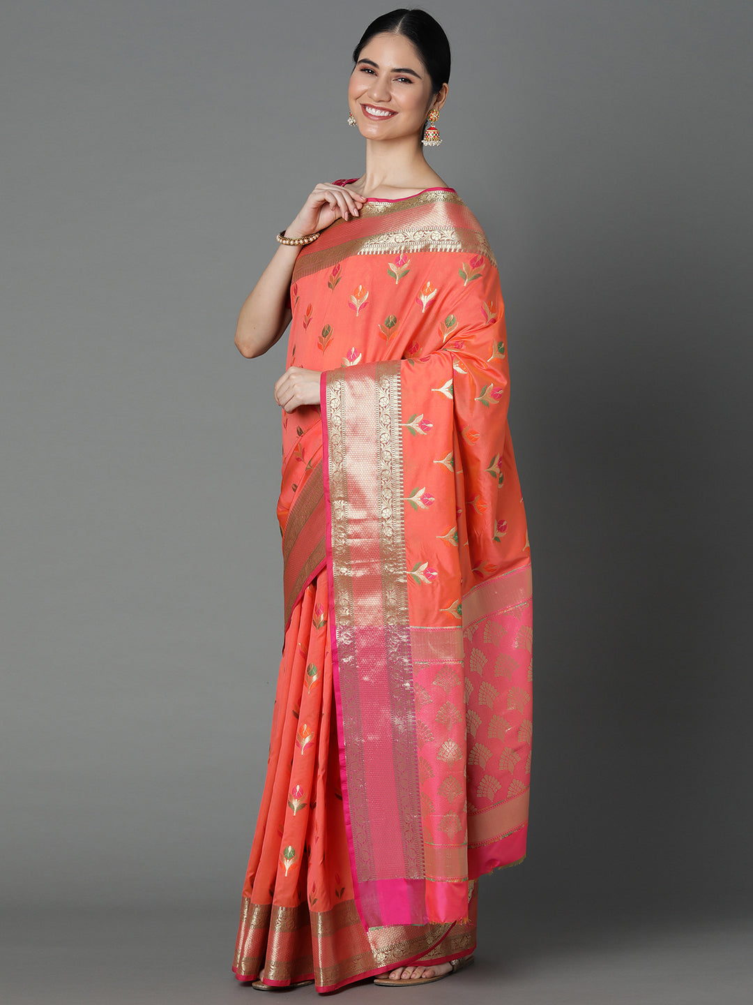 Features A Radiant Silk Blend Saree With Jacquard Ethnic Buttis All Over