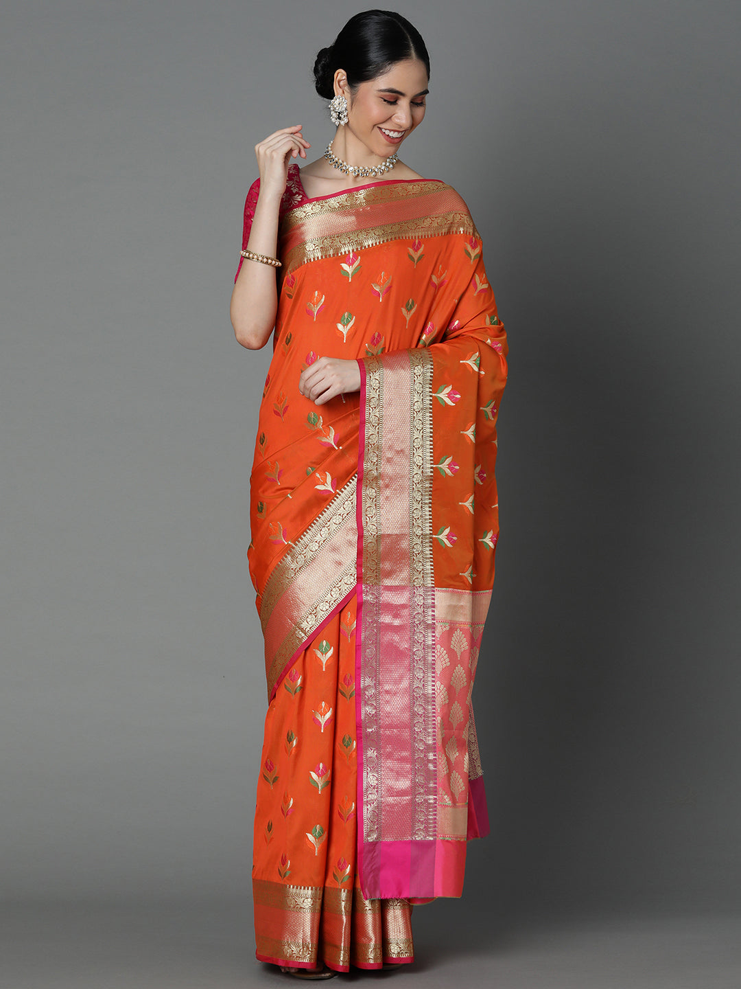 Features A Radiant Silk Blend Saree With Jacquard Ethnic Buttis All Over