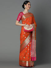 Features A Radiant Silk Blend Saree With Jacquard Ethnic Buttis All Over